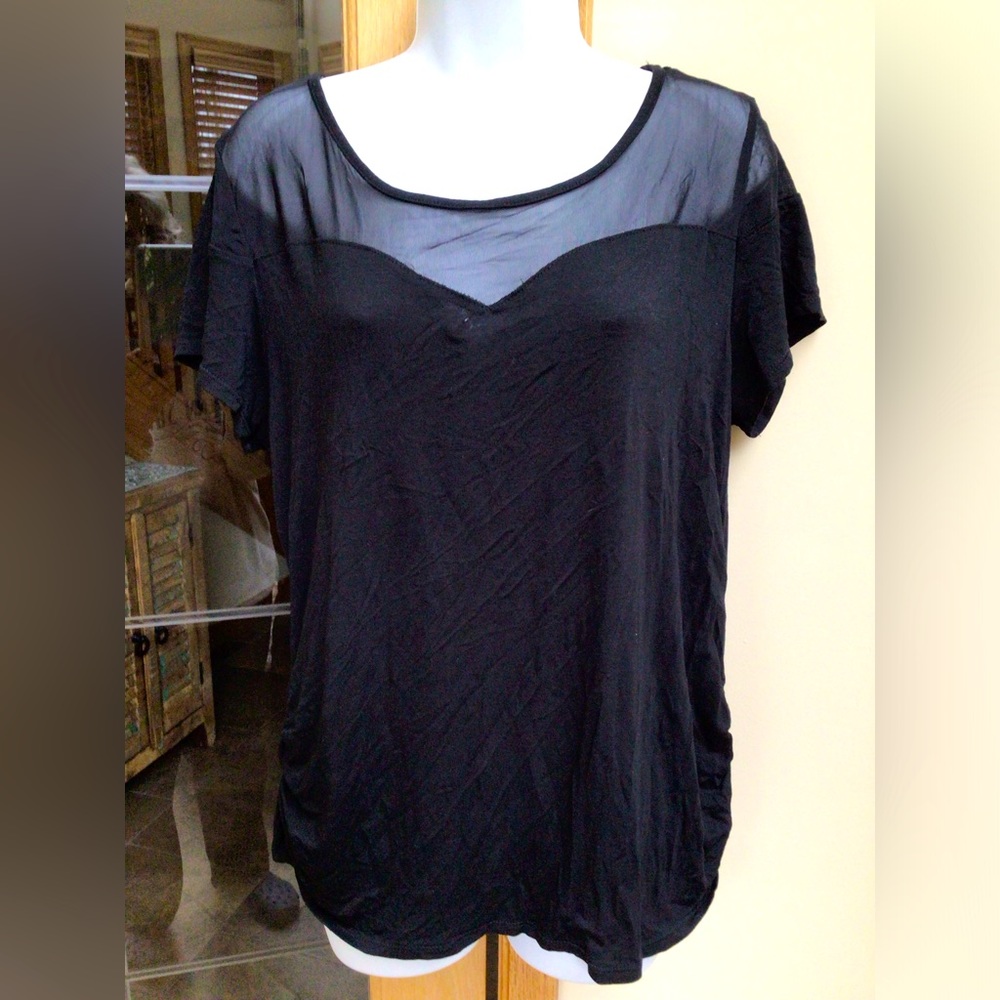 Libian ladies black semi sheer top. EUC.